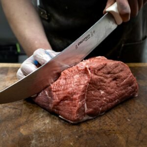 sliced meat on brown wooden chopping board